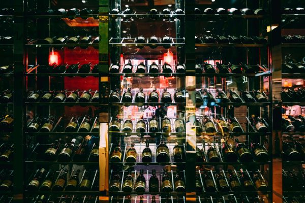 Rows of wine bottles in storage.